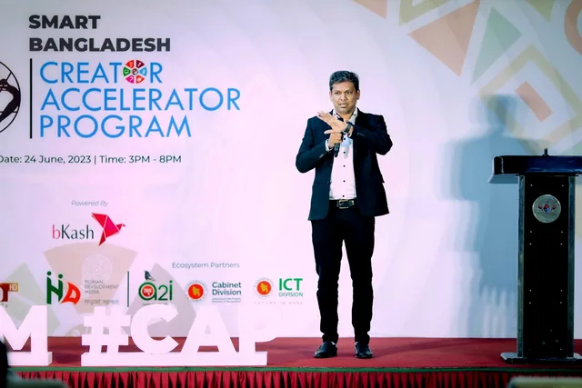 Tawfique Ahmed speaking at the Smart Bangladesh Creator Accelerator Program